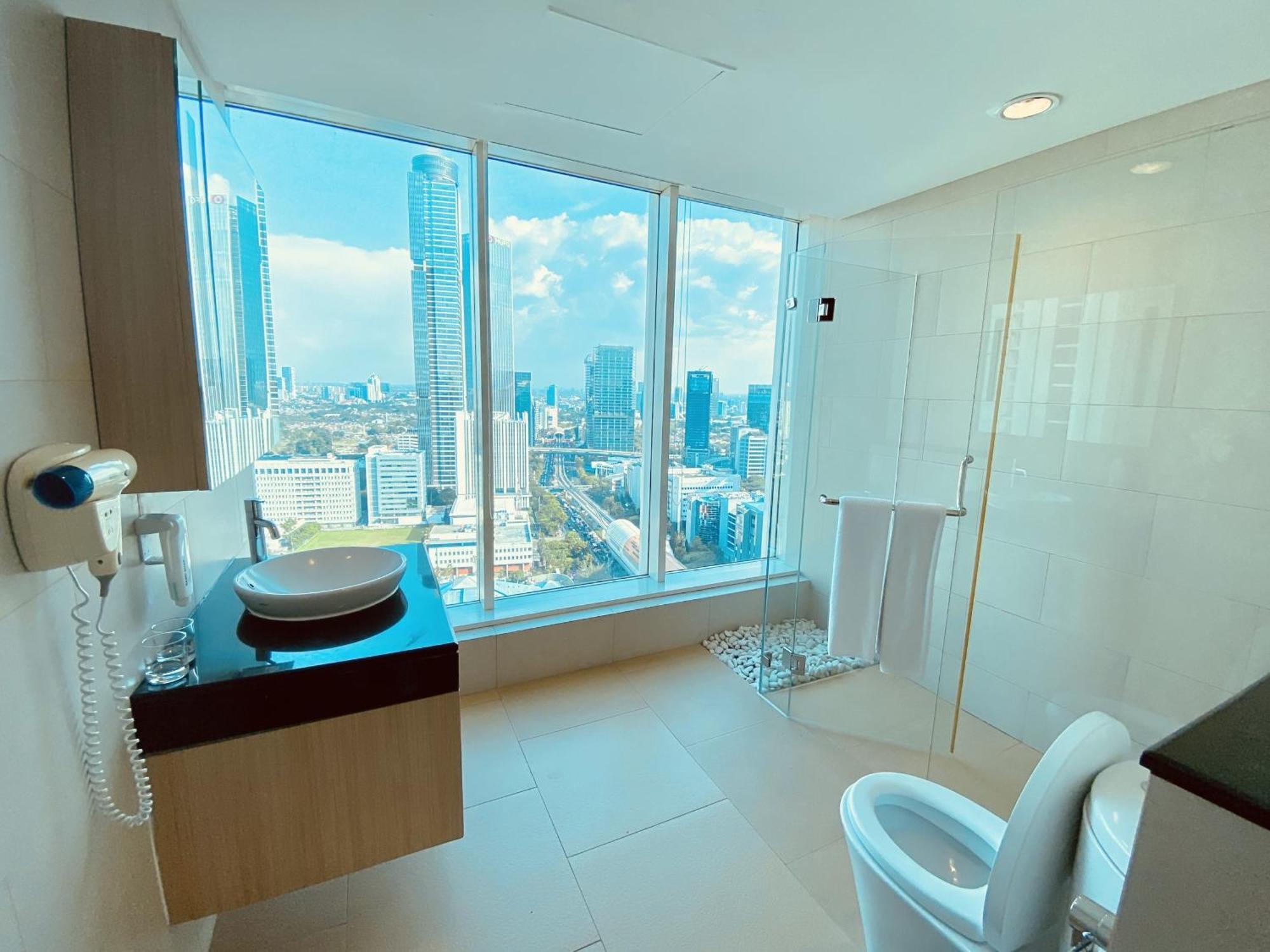 The H Tower Rasuna Suites Kuningan Jakarta By Villaloka 外观 照片